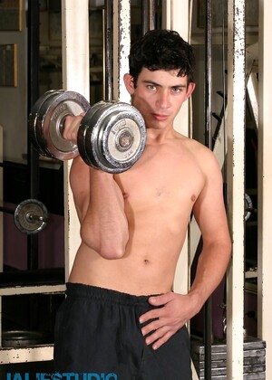 Gay brunette Gibson shows his hard dick & nice booty while lifting weights