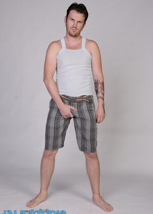 Lonely gay dude Luke Cross strips and shows his tattooed body and hard dick