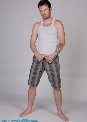 Lonely gay dude Luke Cross strips and shows his tattooed body and hard dick