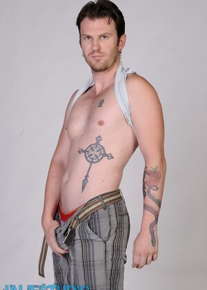 Lonely gay dude Luke Cross strips and shows his tattooed body and hard dick