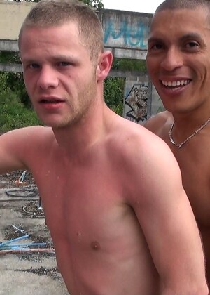 Sexy gay dudes Martin Claus and Rod Malek bang doggystyle outdoors