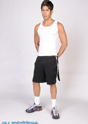 Good-looking gay hunk Jack Spade shows off his athletic body & tattoos