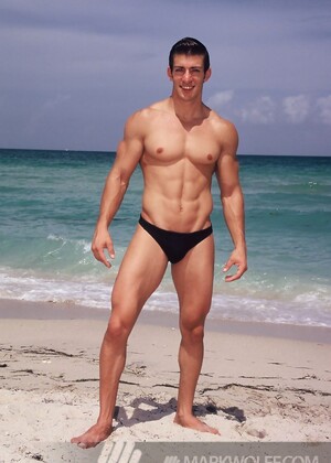 Sexy Zack Johnathan shows off his body on the beach