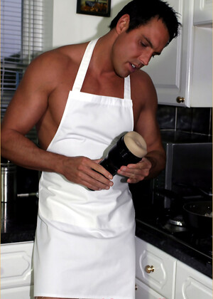Cooking in the nude makes Marcello's cock rock solid