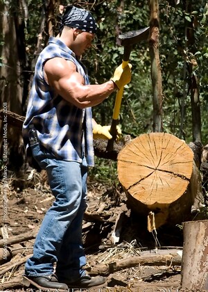 Hot muscle hunk in a forest