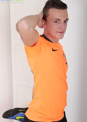 Tattooed boy Dom Ully jerks off with his Nike shoe.