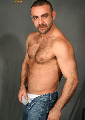 Hairy mature man Manu Maltes shows his uncut cock