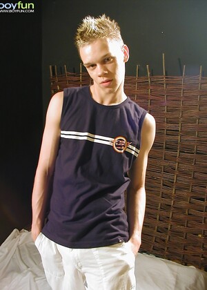 Blonde twink Mason oils up his tight smooth body.