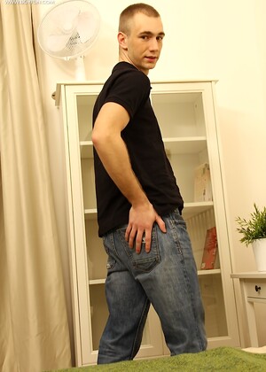 Uncut Aiden Reyes spreads his hairy ass cheeks.