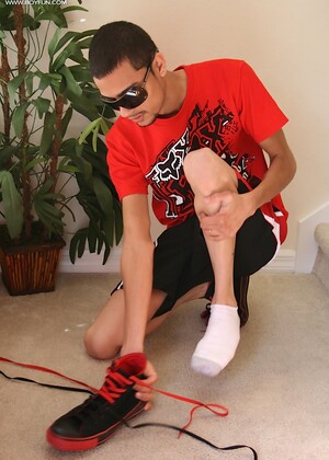 Latin twink Jesiel Alvardo stroking his hard cock.