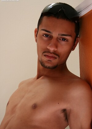 Latin twink Jesiel Alvardo stroking his hard cock.