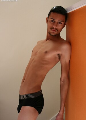 Latin twink Jesiel Alvardo stroking his hard cock.
