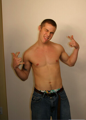 Blonde stud Jack posing butt naked with his huge dick in his hands