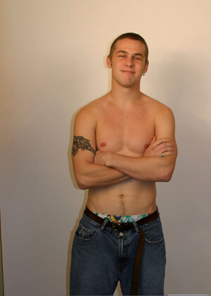 Blonde stud Jack posing butt naked with his huge dick in his hands