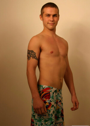 Blonde stud Jack posing butt naked with his huge dick in his hands