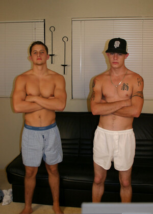 Horny twinks Rey Gold & Kane strip naked and masturbate together on the sofa