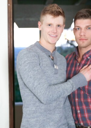 Kinky gay hunks Alex Tanner and Bridger Watts ride each other's cock on a bed