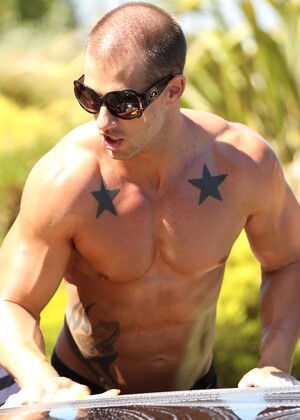 Muscular gay hunks have wild groupsex with well-endowed carwash boys
