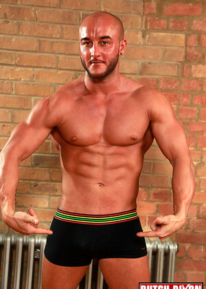 Lee David. Big, burly, Bi-sexual, with a donkey dick and bulging muscles.