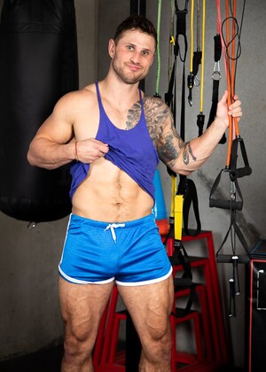 Hot gay Aiden Langston has a wild threesome with muscular men at the gym