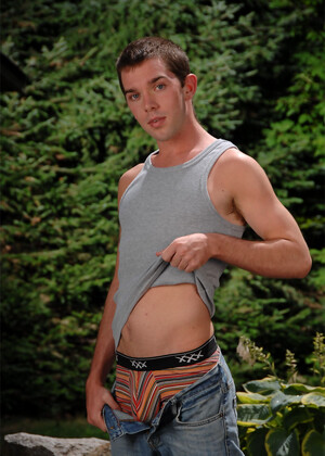 Sexy amateur gay Jeremy Feist exposes his huge dong and poses outdoors
