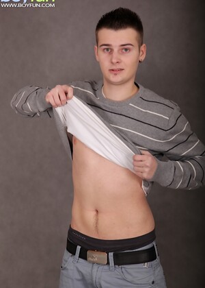 Cute boy Jace Bryant busts a nut over his stomach.