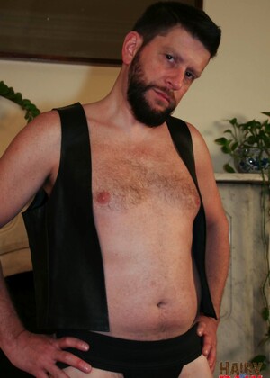 Dark haired gay Randy Scott wanking off his dick