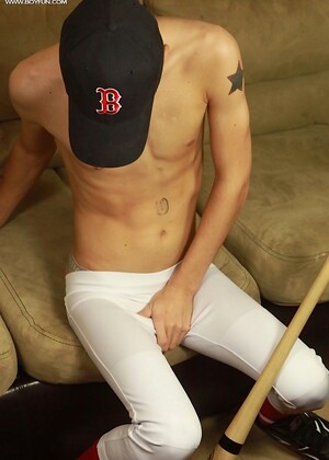 Athletic stud London Sawyer jerks off after baseball game.