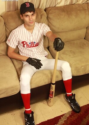 Athletic stud London Sawyer jerks off after baseball game.