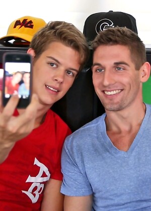 Cute gays Brad Rockwell and Alex Jordan ride each other's knob on a bed